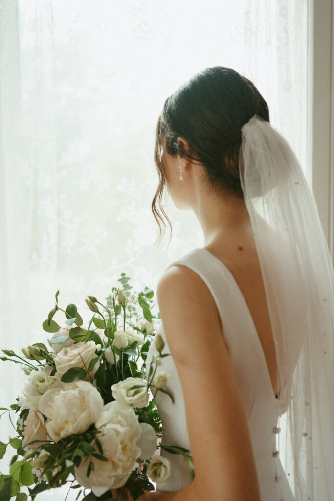 bride looking out the window