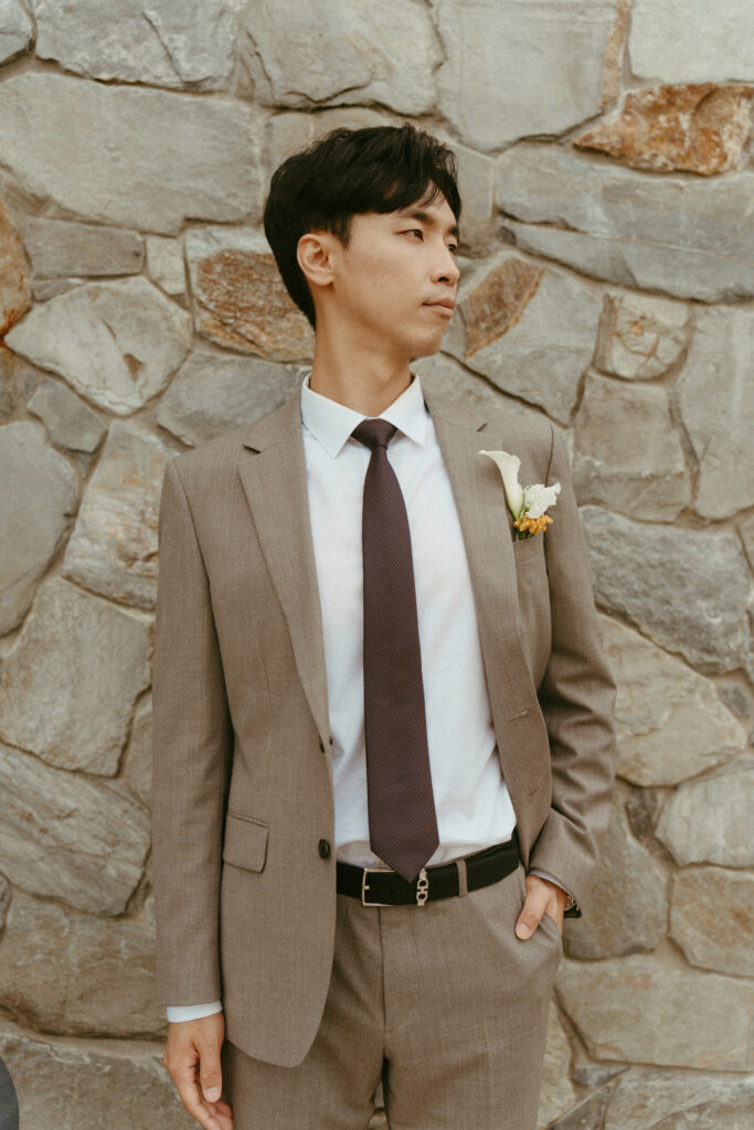 Individual Groom Portrait at a stone wall