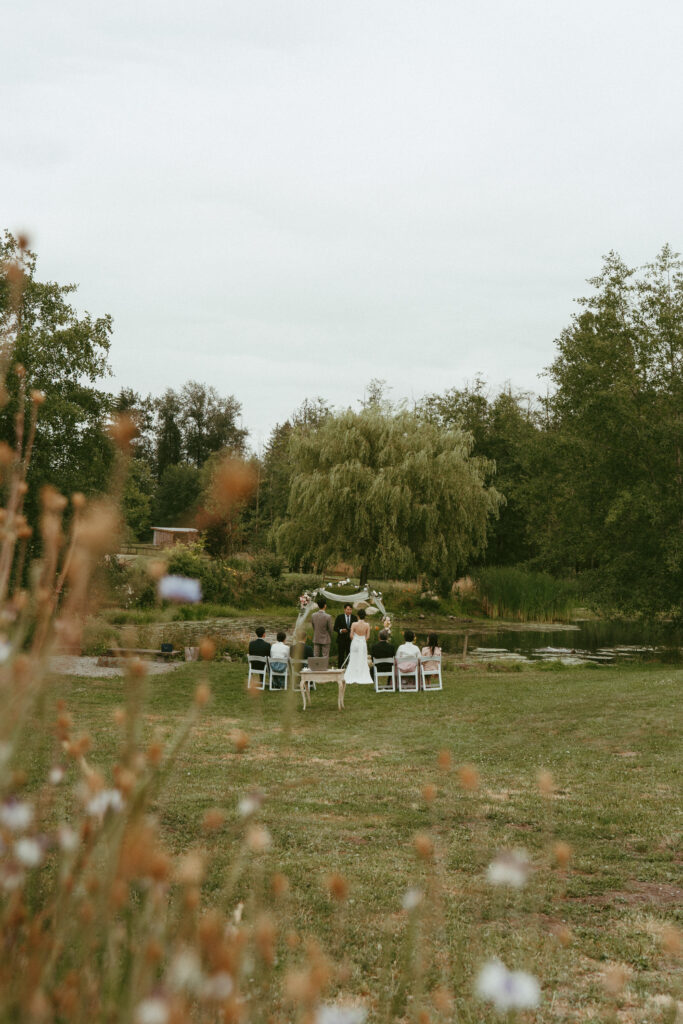 Wedding Ceremony at the pond at Sage & Solace Wedding Venue in Langley, BC